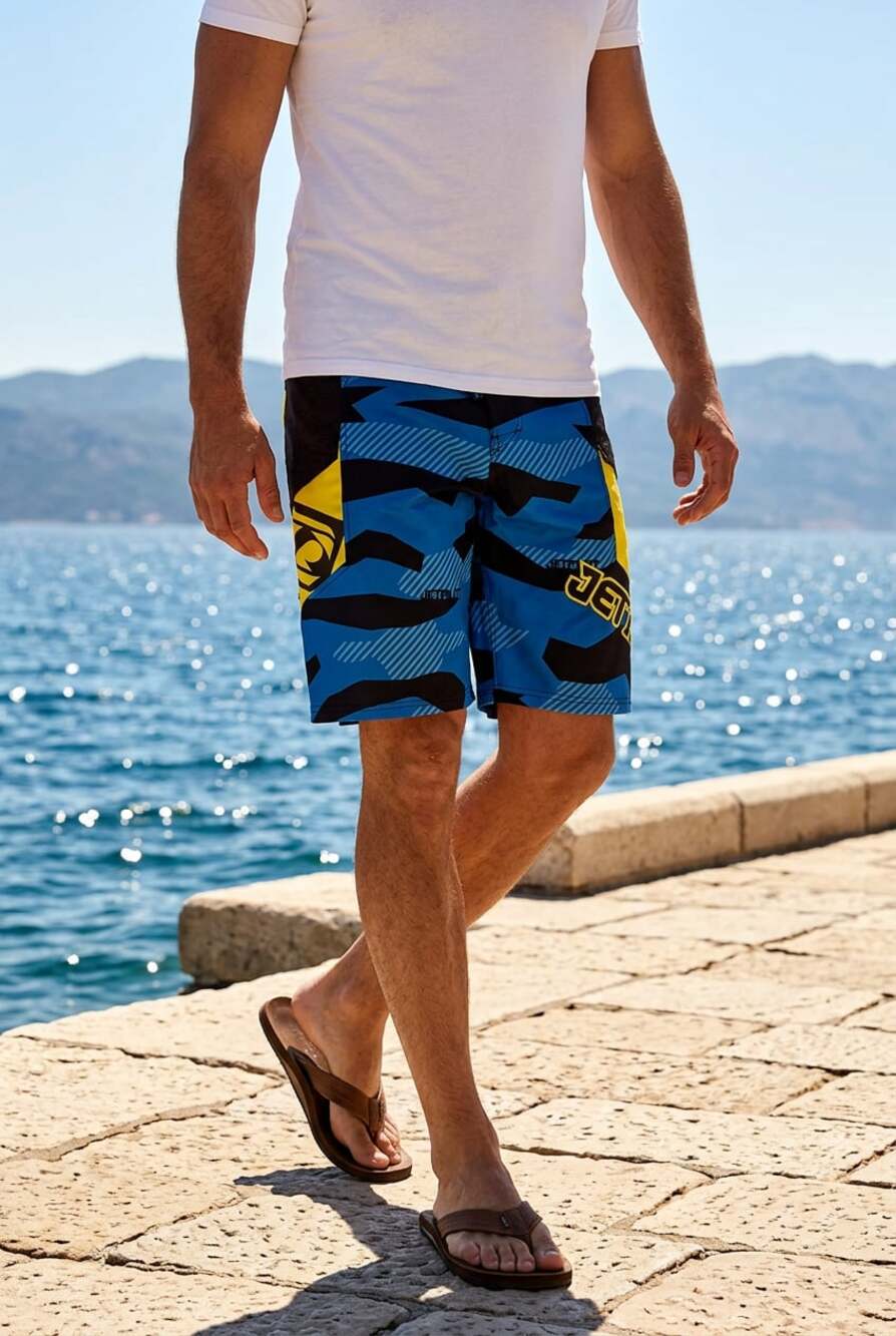Jetpilot Men's Blue and Black Camo Boardshorts with Yellow Accents Size 32